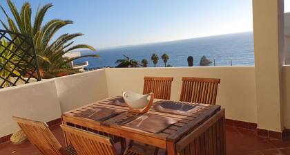 2-Bedroom Sea View Apartment with Pool & Wi‑Fi — 2 min Walk to Praia Dona Ana