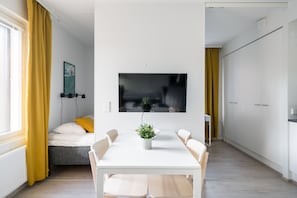Family Apartment, Balcony | In-room dining