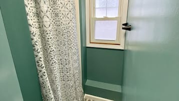 Shower, towels, soap, toilet paper
