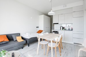 Standard Apartment, 1 Bedroom, Balcony | In-room dining