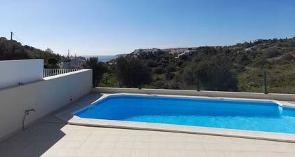 New villa with pool in Salema Ideal location lovely sea and countryside views.
