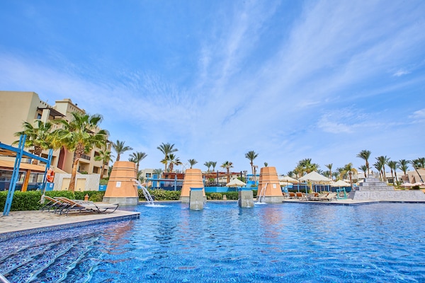 2 outdoor pools, pool umbrellas, lifeguards on site