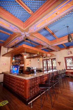 5 bars/lounges, poolside bar, beach bar