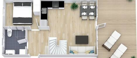 A compact hotel room with a bed, a small kitchenette, a dining area, and a balcony with seating.