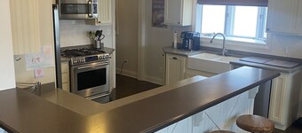 Beautiful lakefront view on Lauderdale Lakes only steps away from golf course. 