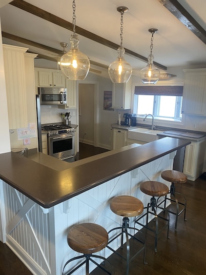 Beautiful lakefront view on Lauderdale Lakes only steps away from golf course.