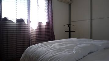 2 slaapkamers, een strijkplank/strijkijzer, gratis wifi