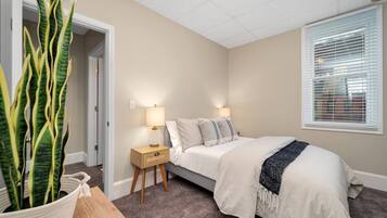2 bedrooms, desk, iron/ironing board, travel crib
