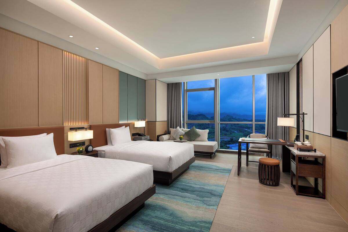 Down comforters, minibar, in-room safe, blackout drapes