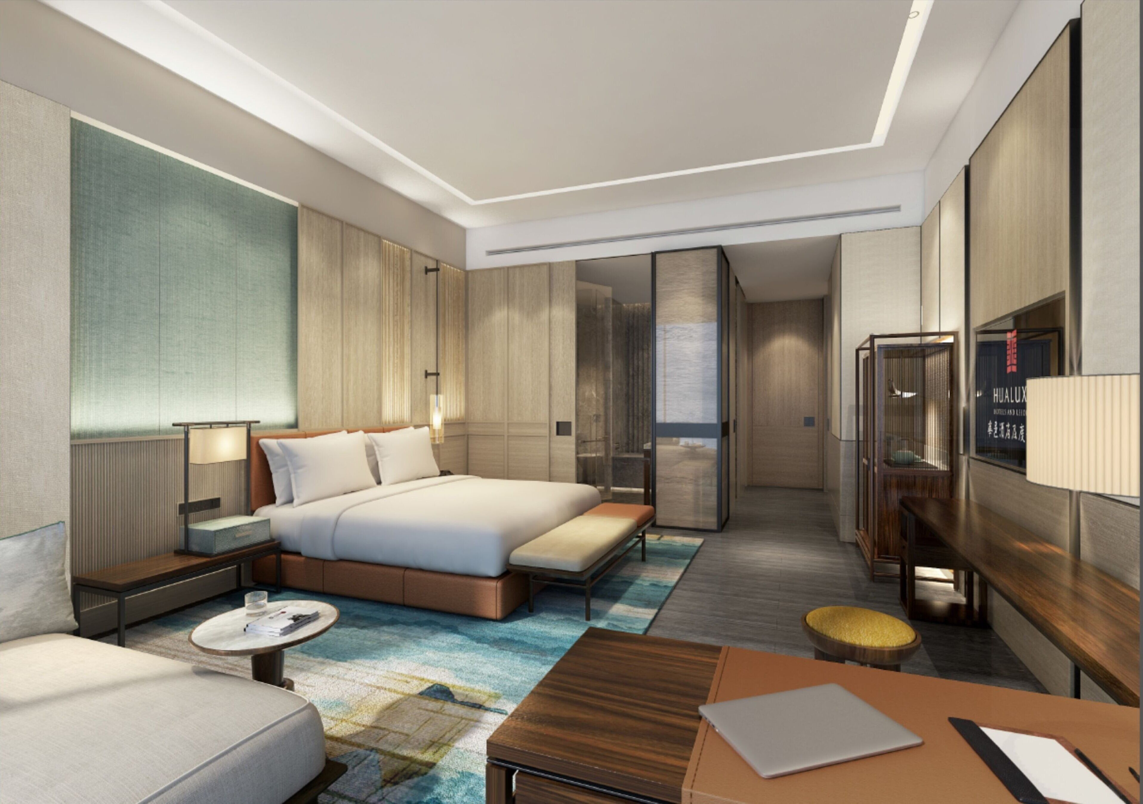 A modern hotel room with a large bed, a desk, a sofa, and a TV.