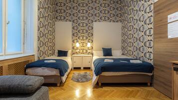 Basic Quadruple Room | In-room safe, blackout drapes, soundproofing, iron/ironing board