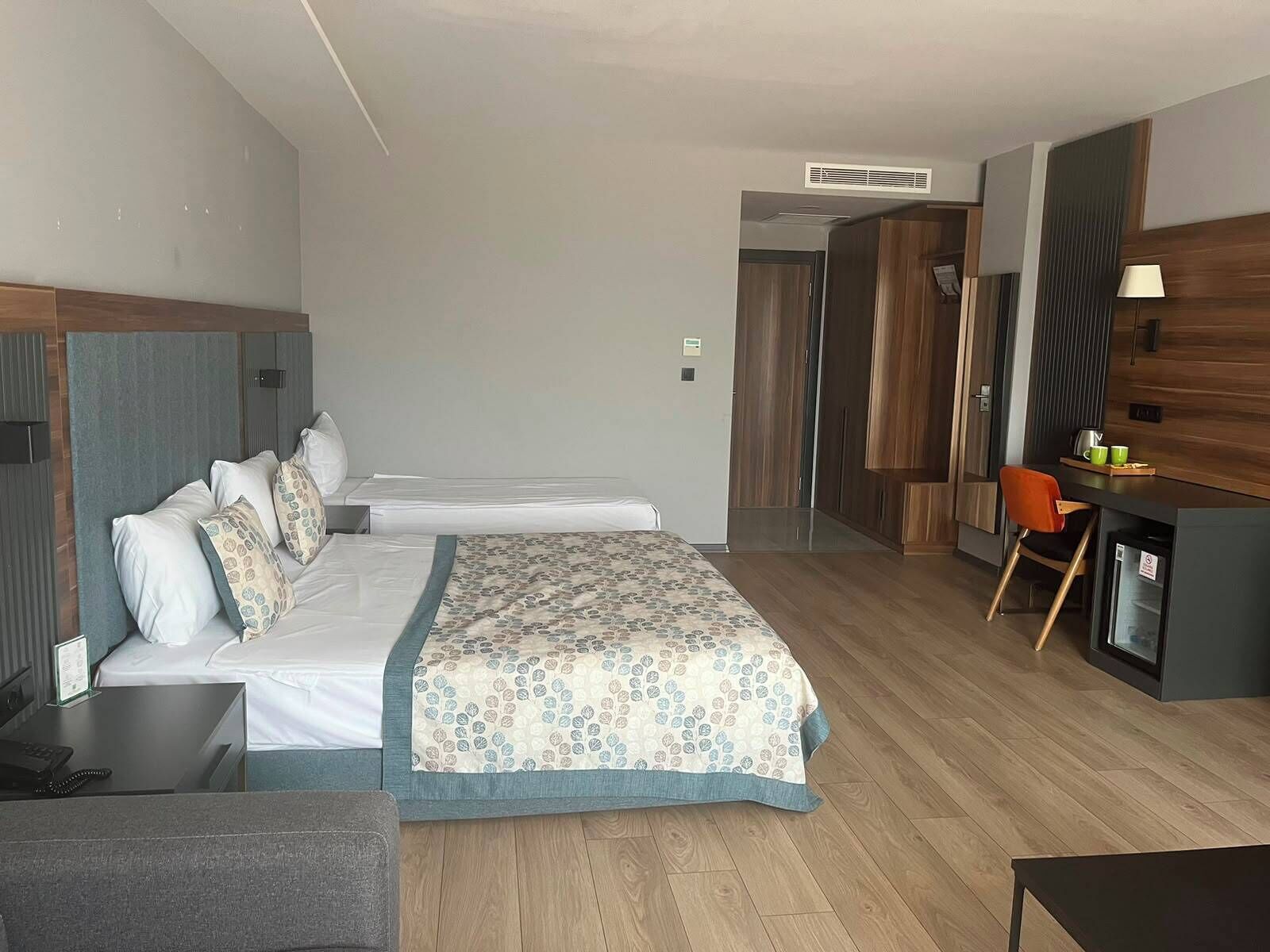 Suite Deluxe | Literie de qualité, lit avec matelas Select Comfort, minibar