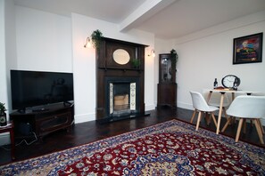 Family Apartment | Living area | Flat-screen TV