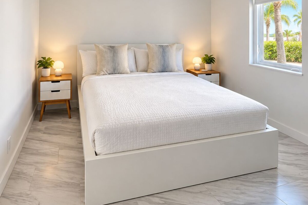 Deluxe Apartment | Premium bedding, down comforters, blackout drapes, iron/ironing board