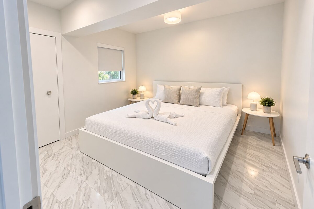 Premium bedding, down comforters, blackout drapes, iron/ironing board