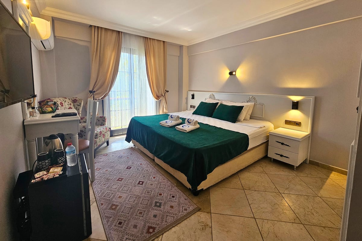 Phòng dành cho gia đình | 1 phòng ngủ, minibar, két bảo mật tại phòng, bàn