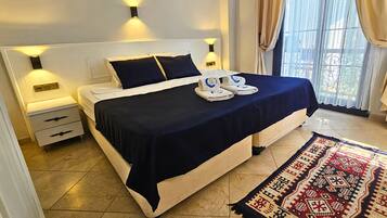 标准房, 花园 | 迷你吧、客房内保险箱、办公桌、笔记本电脑工作区