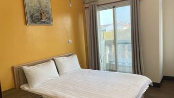 Family Quadruple Room | Down comforters, individually decorated, individually furnished