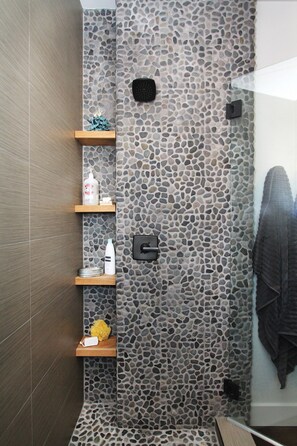 Shower, hair dryer, towels, soap