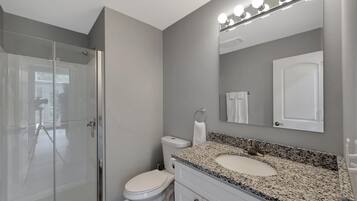 Shower, towels, toilet paper