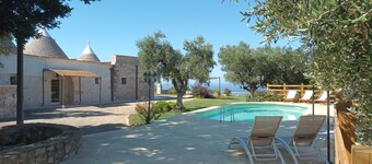 Panoramic trulli for 7 people in the hills with exclusive swimming pool 8 km from the sea