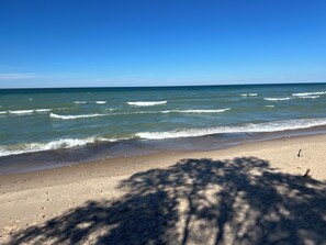 On the beach, sun-loungers, beach towels