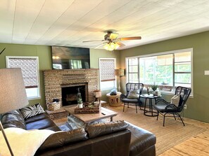 Smart TV, fireplace, DVD player, books