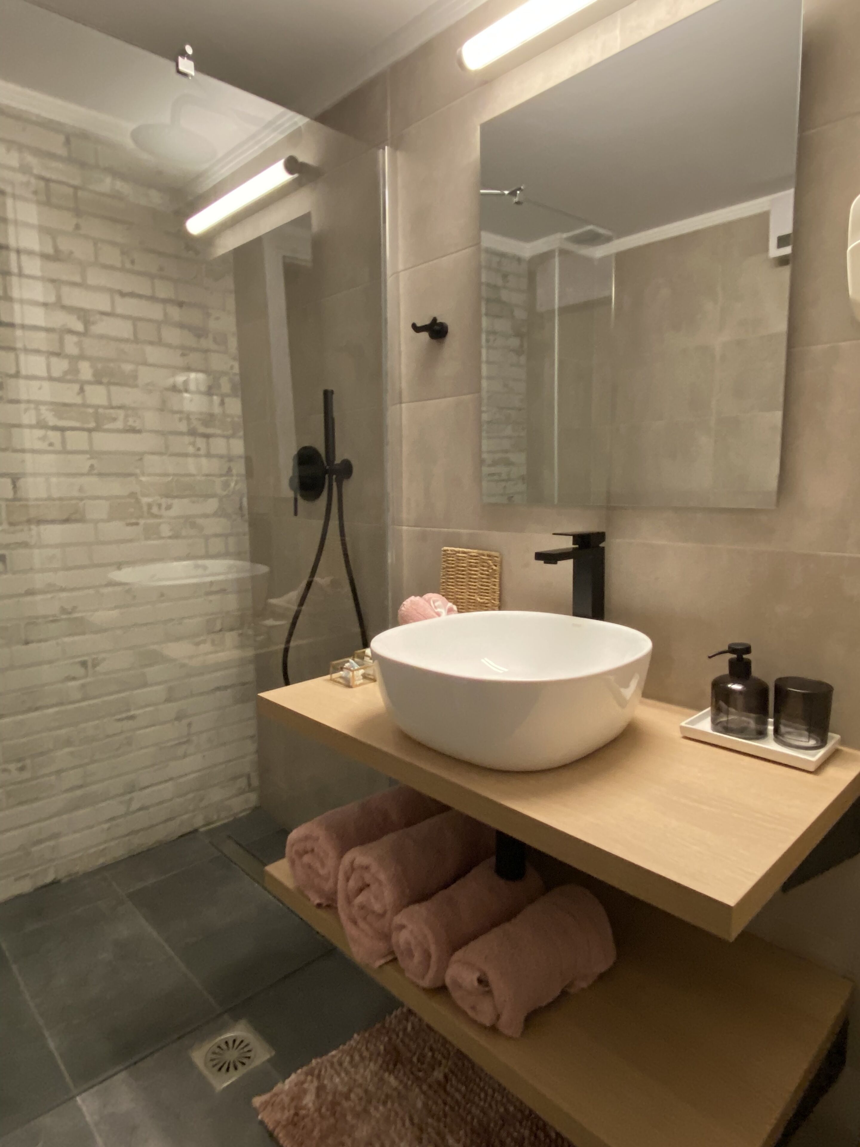 Combined shower/tub, jetted tub, hair dryer, bidet