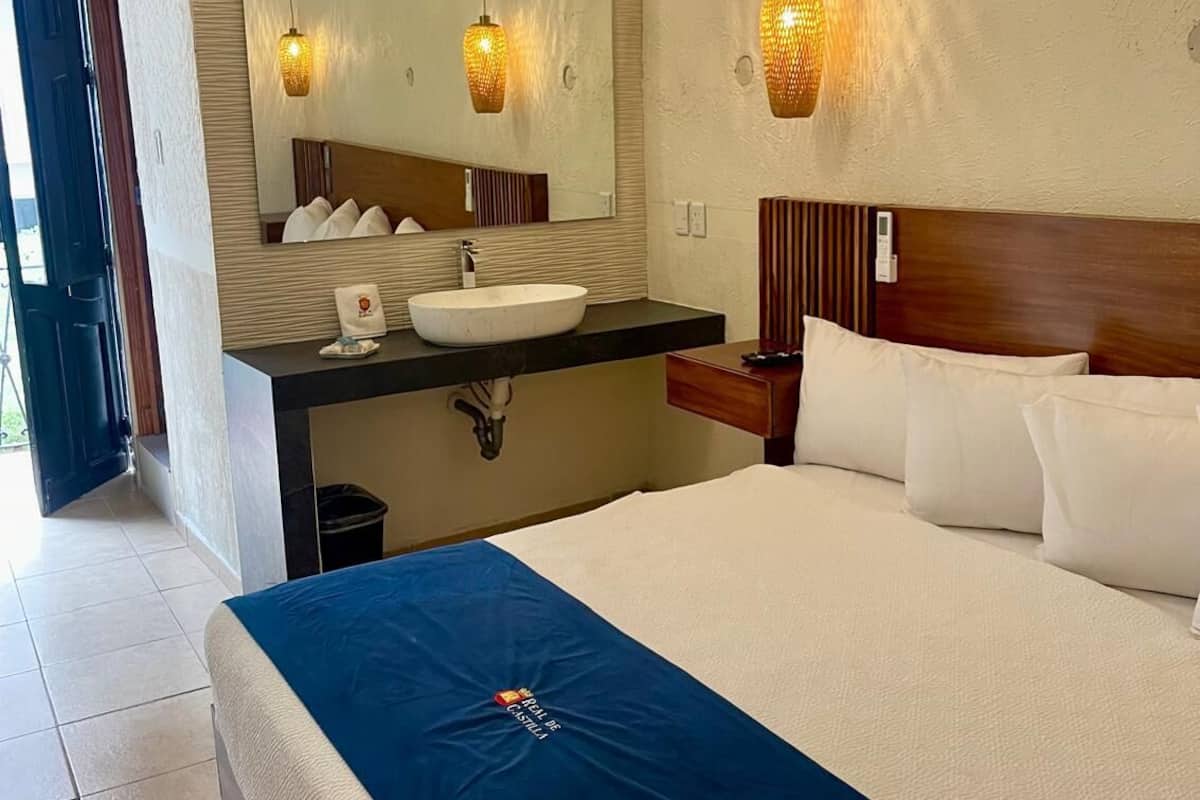 Room, 1 King Bed | Down comforters, individually furnished, bed sheets