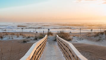 On the beach, sun-loungers, beach towels
