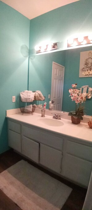 Combined shower/bathtub