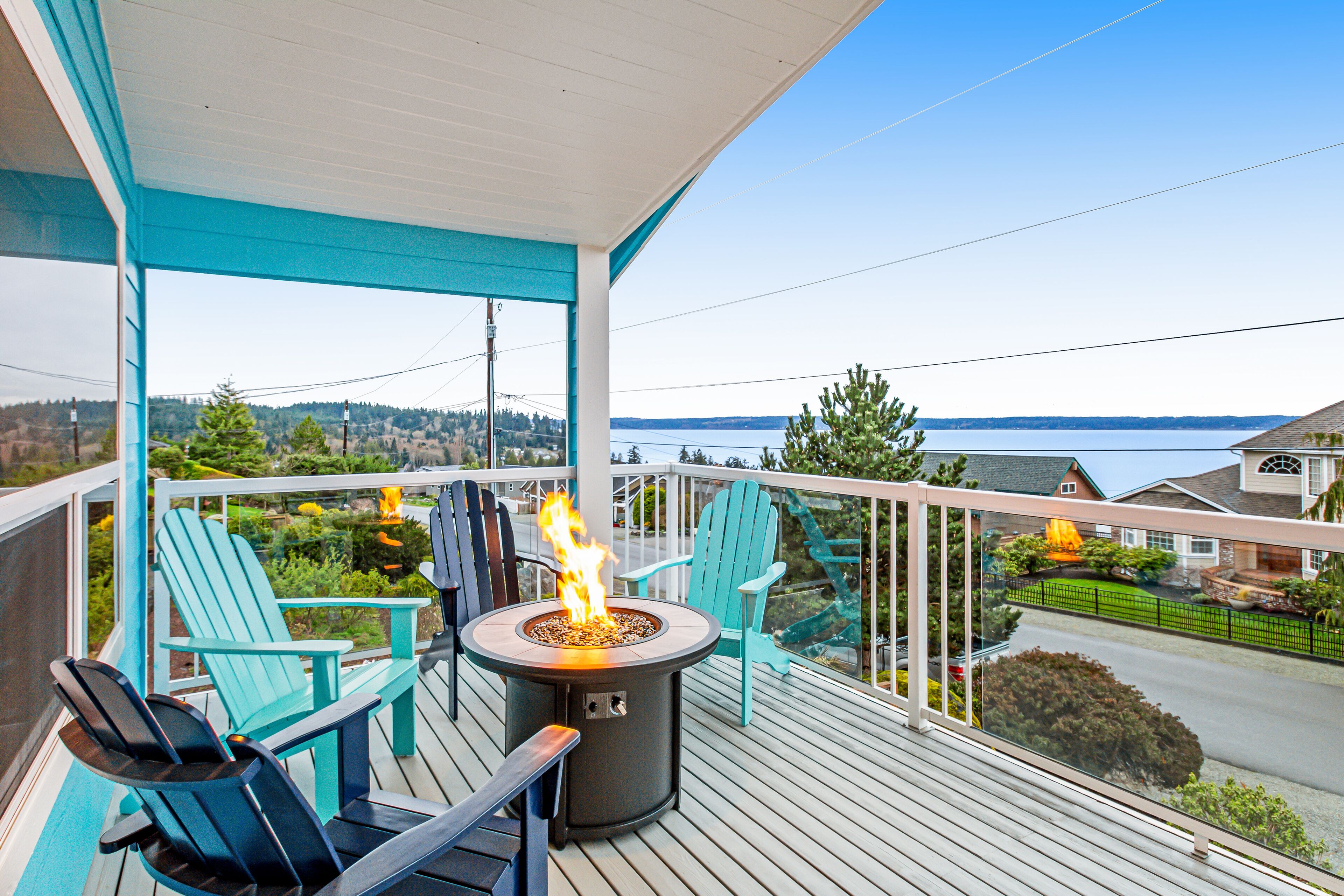 Water-view wonder with private hot tub, guest suite, game room, fireplace & W/D