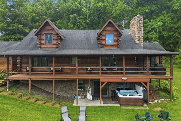 Plenty of places to relax and connect w/hot tub, deck, fire pit & fishing dock.