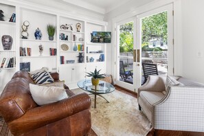 Smart TV, fireplace, books