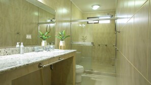 Standard Quadruple Room | Bathroom | Shower, rainfall showerhead, towels, soap