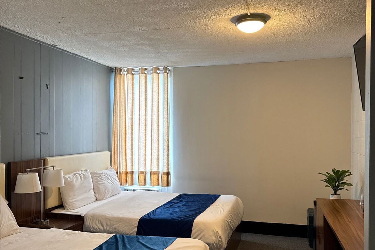 Comfort Room, Multiple Beds | Select Comfort beds, desk, laptop workspace, blackout drapes