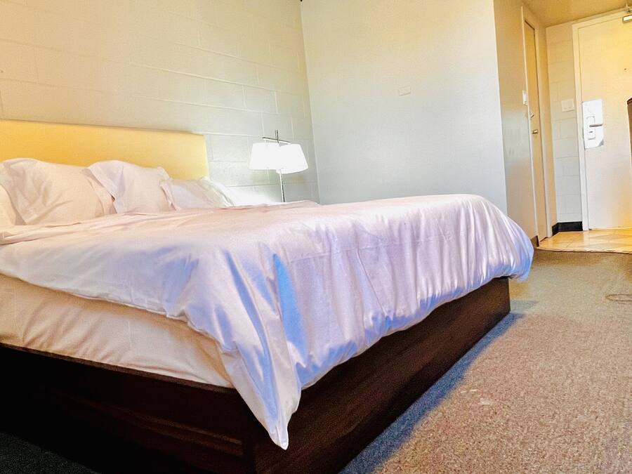Select Comfort beds, desk, laptop workspace, blackout drapes