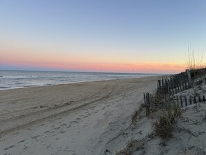 On the beach, beach towels - OCEANFRONT OASIS - perfect pet friendly OBX getaway (Kill Devil Hills)