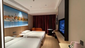 A hotel room with two beds, a television, a painting of a cityscape, and a window with curtains.