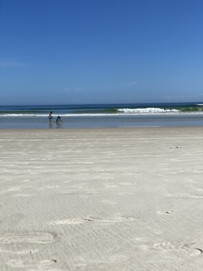 On the beach, sun loungers