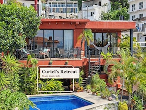 Villa Amistad by day, Puerto Vallarta: two floors of apartments above the heated pool