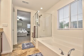 Combined shower/tub, hair dryer, towels, soap