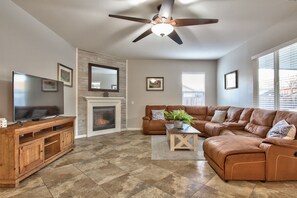 Smart TV, fireplace, books