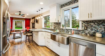 Quiet & secluded getaway with backyard, firepit, wraparound deck & wood stove