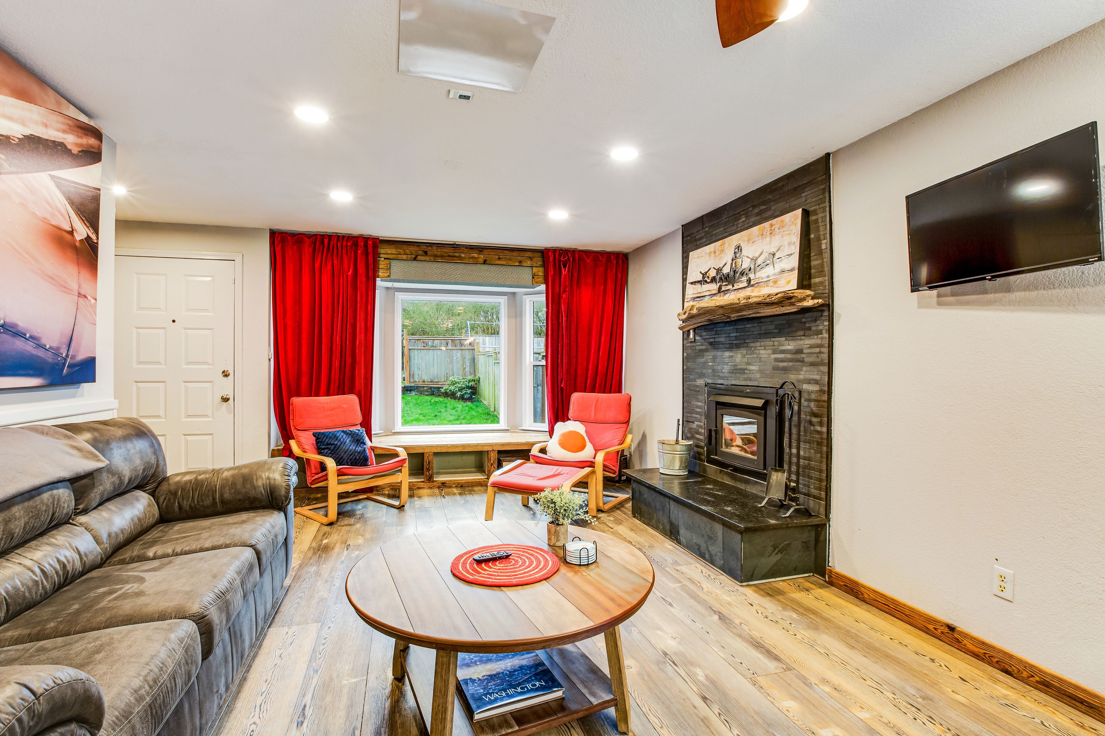 Quiet & secluded getaway with backyard, firepit, wraparound deck & wood stove