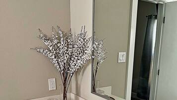 Combined shower/tub, hair dryer, towels, soap