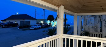 Literally feet away from the beach. Newly remodeled! Perfect for a party of 2-8