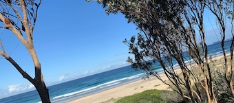 Immaculate designer house-sweeping views over iconic Blueys Beach 3min walk away