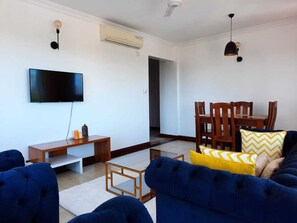 Elite Apartment | Living area | 24-inch Smart TV with digital channels, TV
