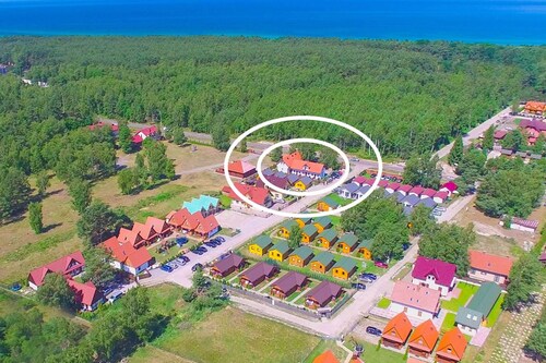 Quaint Holiday Home in Gleznowo with Parasol